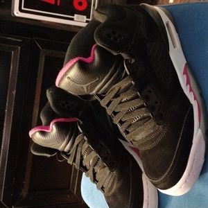Women's  black and hot pink Jordan retro 5's